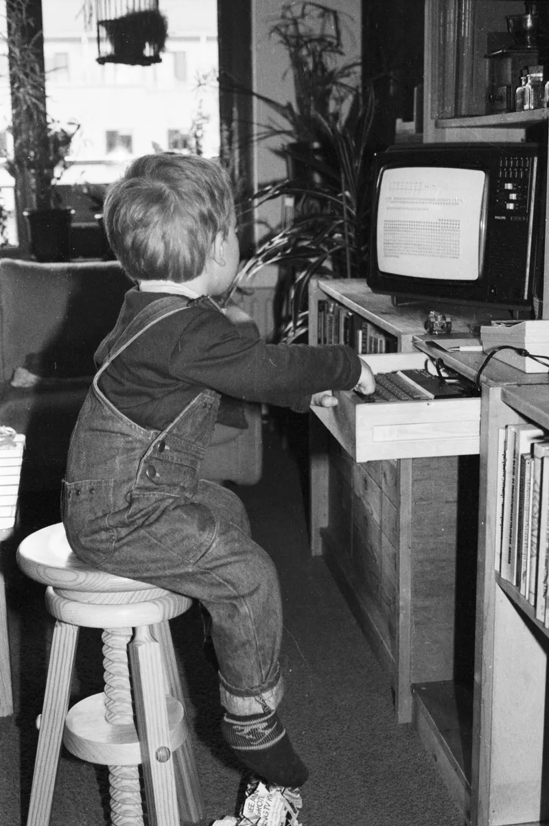 Me around 5 years old, typing away on the ZX spectrum. To be honest, I probably was not coding here.